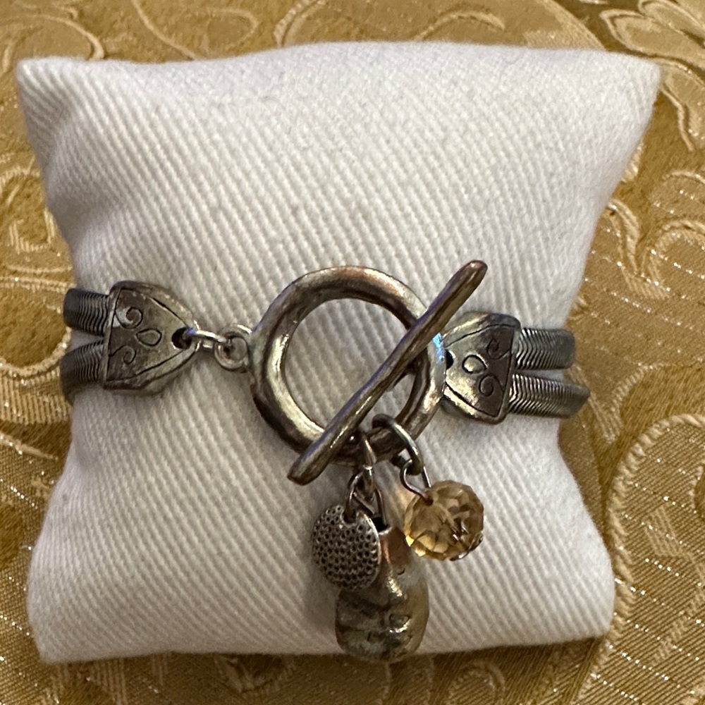 Unique & Artistic Silver Charm Bracelet